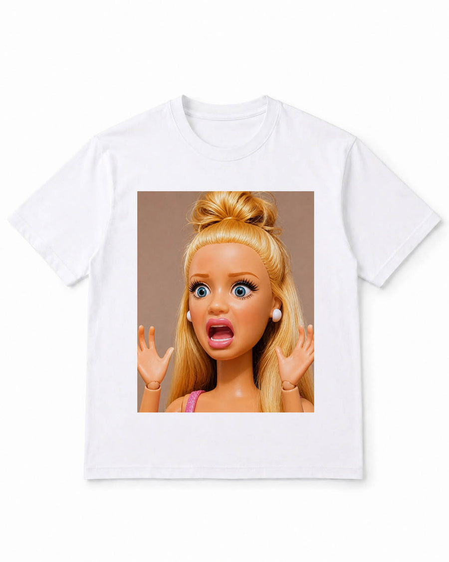 Meme-Puppen-T-Shirt mit schockiertem blondem Puppengesicht – 100 % Baumwolle
